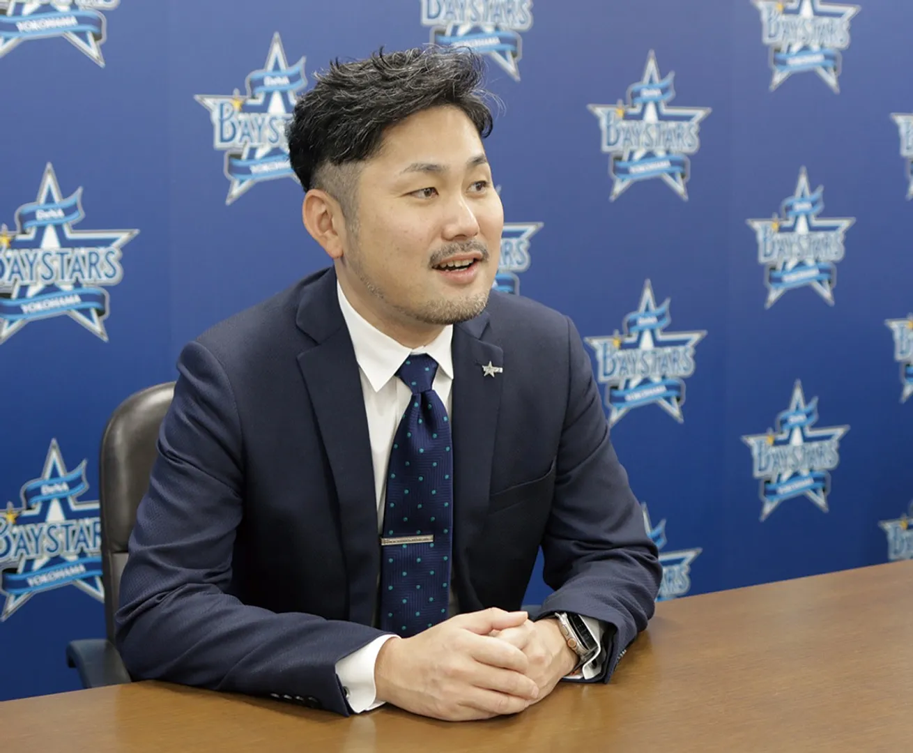 インタビューに応じる萩原チーム統括本部長